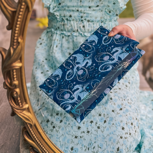 Moonplume Dragon fabric dust jacket (When The Moon Hatched)