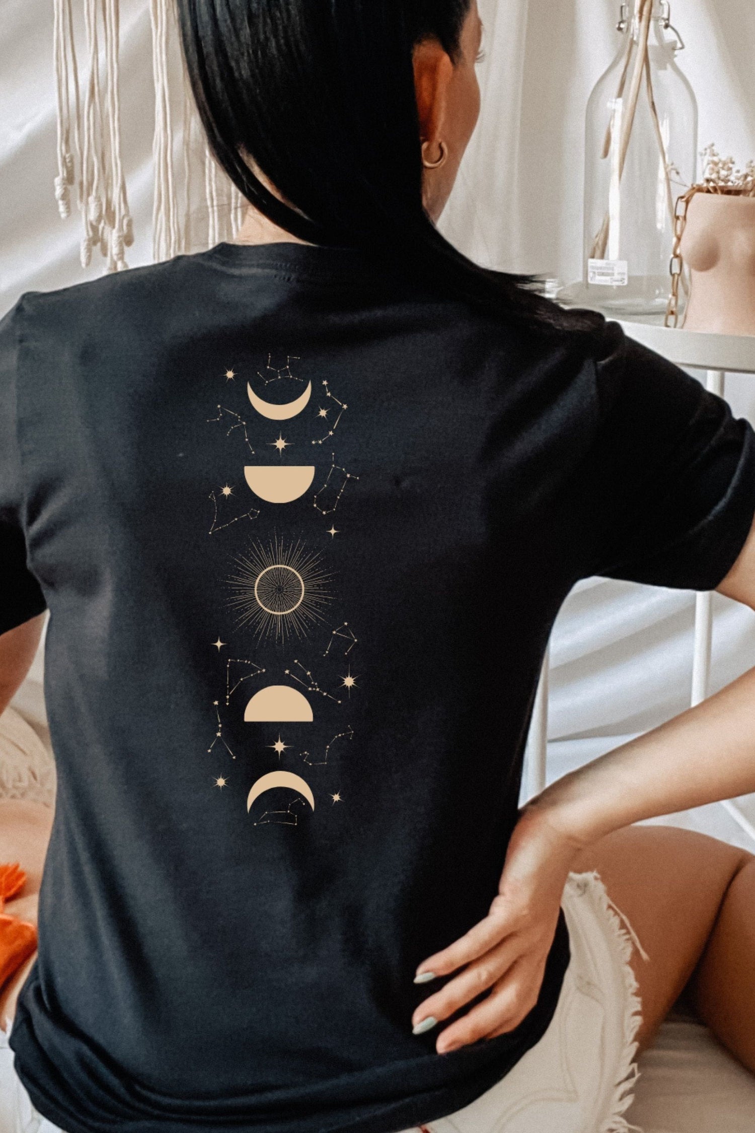 Back view of black t-shirt featuring Feyre’s tattoo design from A Court of Thorns and Roses by Sarah J. Maas, with crescent moon and symbolic markings.