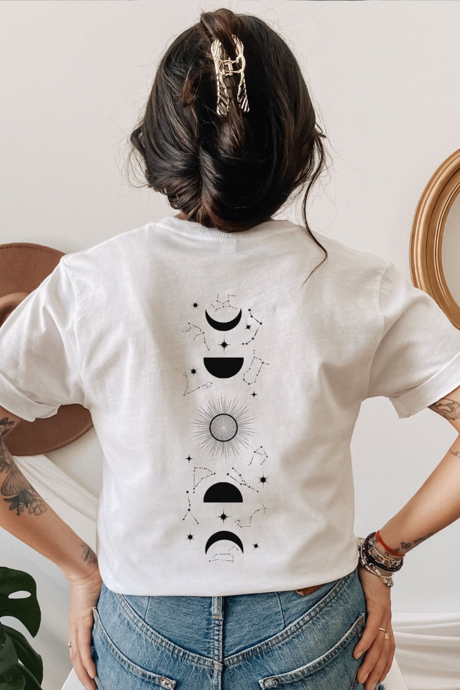 Back view of white t-shirt featuring Feyre’s tattoo design from A Court of Thorns and Roses by Sarah J. Maas, with crescent moon and symbolic markings.