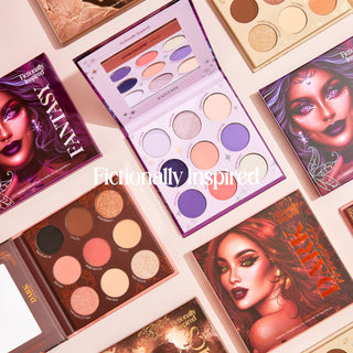 Makeup palettes with artistic covers featuring faces and the brand 'Fantasy' on a light background.