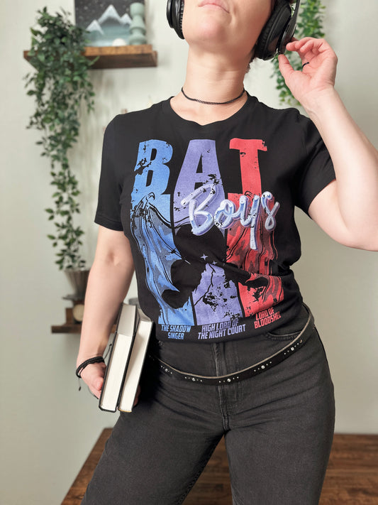 Bat Boys T-Shirt — ACOTAR merch by Sarah J. Maas. Rhys, Cassian, Azriel — the Night Court's beloved trio. Hand-designed in Australia, officially licensed.