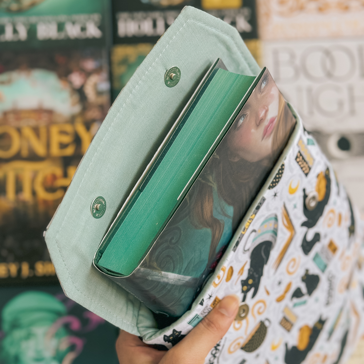 Feline Fables padded book sleeve