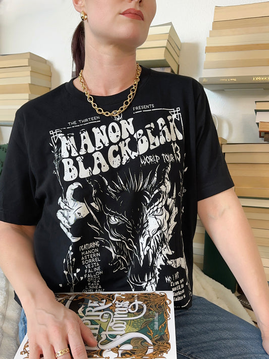 Manon Blackbeak T-Shirt — Throne of Glass merch by Sarah J. Maas. Wing Leader of the Thirteen, the witch who broke her line. Hand-designed in Australia, officially licensed.