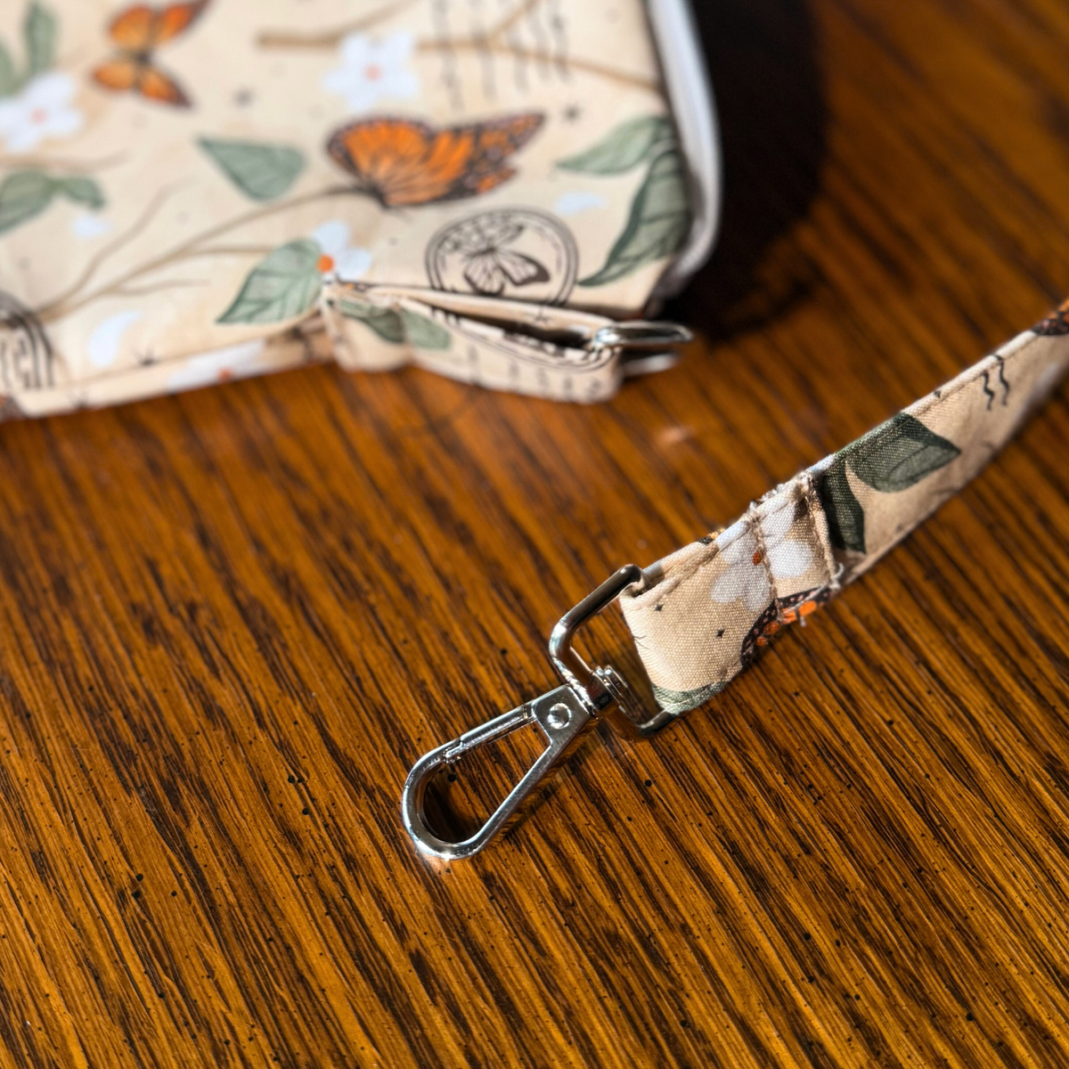 Monarch Story crossbody sleeve
