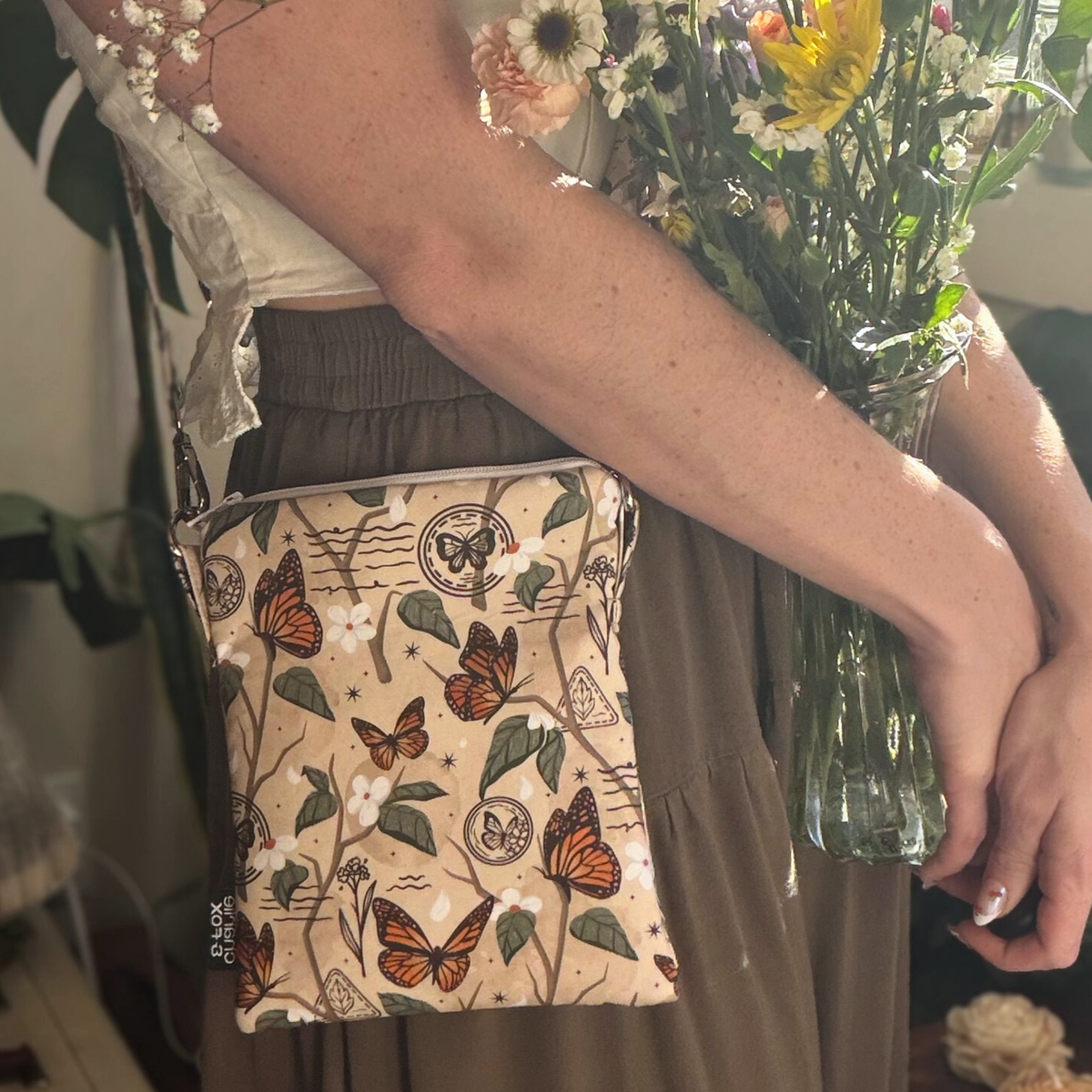 Monarch Story crossbody sleeve