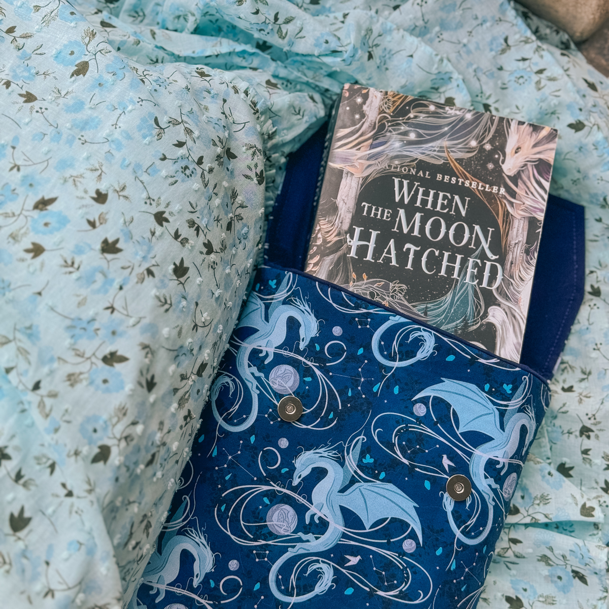 Moonplume Dragon padded book sleeve (When The Moon Hatched)