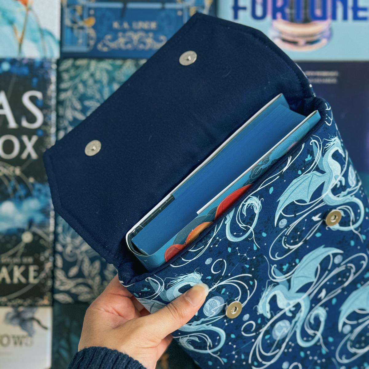 Moonplume Dragon padded book sleeve (When The Moon Hatched)