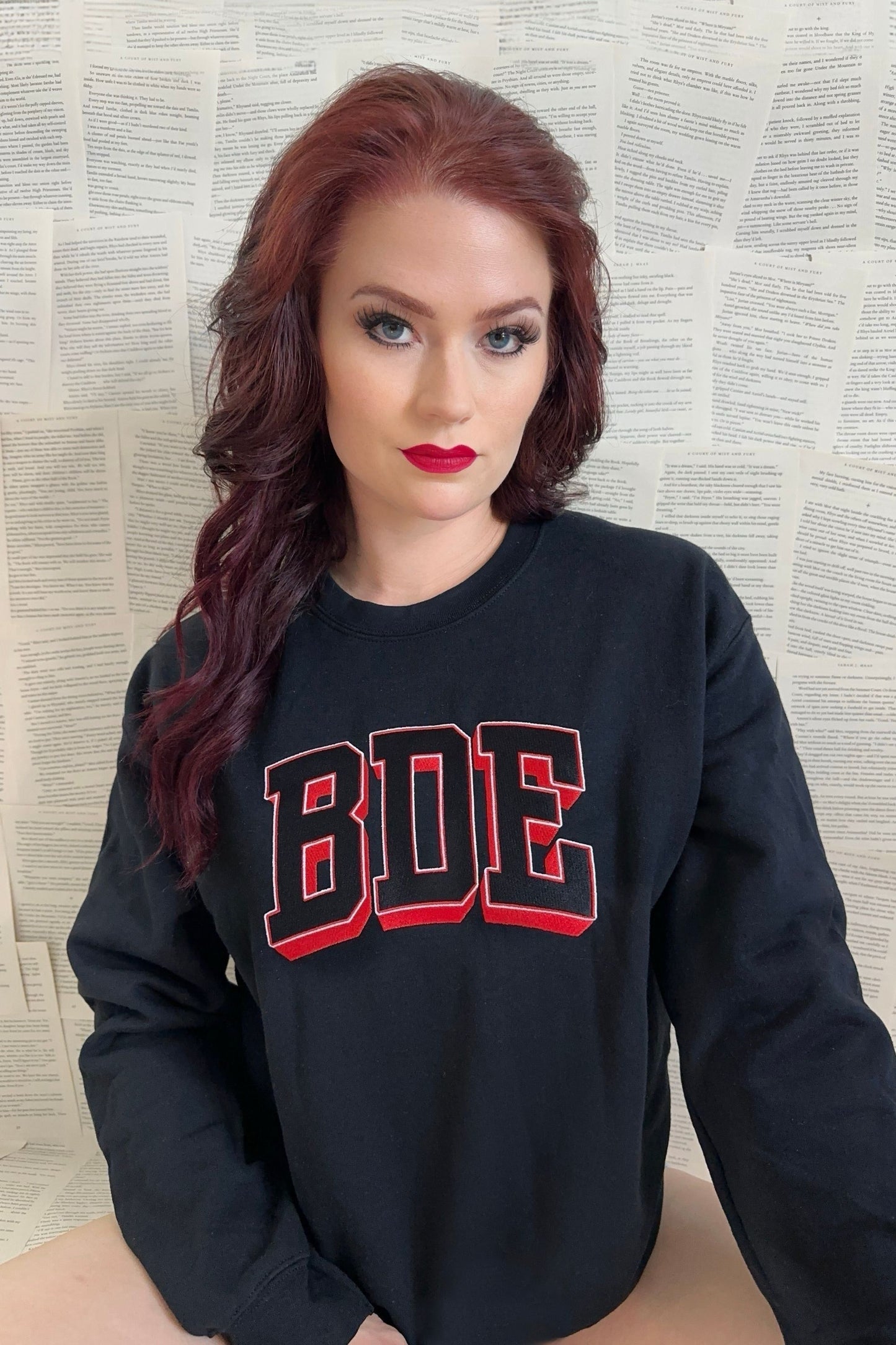 BDE Embroidered Sweatshirt — Hades merch by Tate James. The energy you bring to the room — embroidered loud. Hand-designed in Australia, officially licensed.