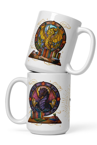 Stacked white ceramic 15 oz mugs featuring illustrated dragon designs, books, and glowing stained-glass backgrounds.  Inspired by Fourth Wing dragons Tairn and Andarna.