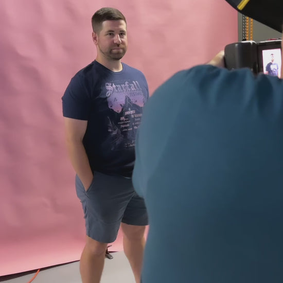 Try-on video: the navy Starfall t-shirt — the Starfall Festival poster print with the mountain under a violet night sky [focal 50 35]