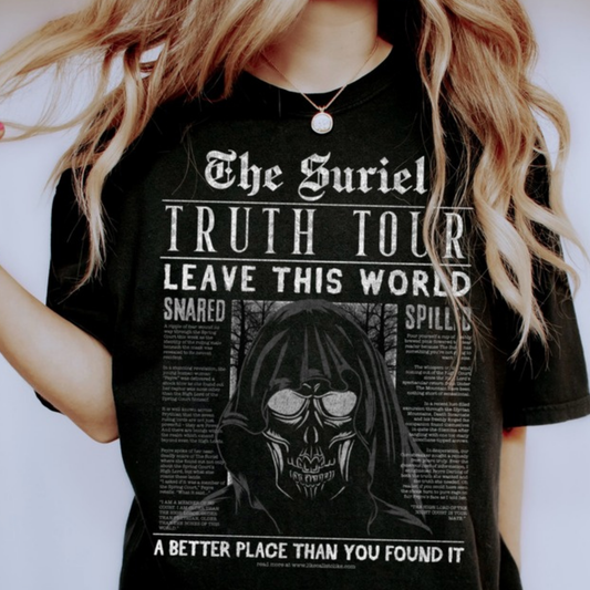 Model in a black The Suriel Truth Tour t-shirt with the hooded skull newspaper print, ACOTAR merch inspired by Sarah J. Maas